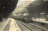 V3 67661 pulls into Glasgow's Charing Cross station on 18 April 1959 with a train from Helensburgh Central.<br><br>[G H Robin collection by courtesy of the Mitchell Library, Glasgow 18/04/1959]