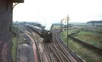 A photograph taken from the signal box at Strawfrank (now Carstairs South) Junction on 15 July 1966, with 70035 <I>Rudyard Kipling</I> about to run past with a train for Liverpool/Manchester. <br><br>[John Robin 15/07/1966]