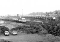 An InterCity 125 HST on the ECML just north of York station in 1980, passing a class 40 standing in the yard.<br><br>[John Furnevel 23/07/1980]