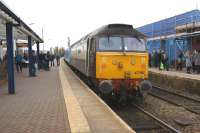 DRS 47790 on the rear of one of the extra Northern services operating on Saturdays between Buckshaw Parkway or Chorley and Manchester Victoria. 47790 is seen at Chorley on 29 November 2014 having terminated with a service from Manchester and departing with the ecs to Preston as the leading diesel (47818) tries to mimic a steam locomotive.<br><br>[John McIntyre 29/11/2014]