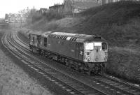 BRCW Type 2 D5305 between Newington and Blackford Hill (with Mayfield Road bridge in the background) in February 1970, heading west along the Edinburgh Sub with an ex-LMS brake-van in tow. No doubt it is engaged on an Edinburgh area target working.<br><br>[Bill Jamieson 09/02/1970]