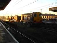 A Yorkshire circuit RHTT working, with 20305 leading and 20304 tailing, photographed on 3 December. The train is running north into Wakefield Westgate on the down through road shortly after 08.30, with the high pressure jets operational for a short distance further. <br><br>[David Pesterfield 03/12/2014]