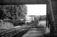 A southbound NIR DMU departs from Lambeg, County Antrim, in July 1986. The train is heading for Lisburn with a Belfast to Portadown service.<br><br>[John McIntyre /07/1986]