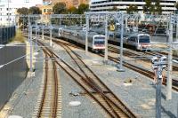 Two Transperth emus running in parallel from the east about to enter Perth City station under the bridge on 7 October 2014. No standard gauge here.<br><br>[Colin Miller 07/10/2014]