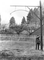 A colleague tests out the Crieff loading gauge during the visit on 17 March 1970. This was sited on the west side of and immediately adjacent to Duchlage Road Bridge.<br><br>[Bill Jamieson 17/03/1970]