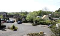 View over Hillfoot station on the Milngavie branch on 28th April 2007. Taken from the flats built as part of the redevelopment of the former goods yard. [See image 7753]<br><br>[Colin McDonald 28/04/2007]