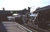 Jubilee 45588 <I>Kashmir</I> recently arrived at Lockerbie from Carlisle on 15 April 1963 with <I>Scottish Rambler No 2</I>. From here the special would head west over the single line Dumfries, Lochmaben and Lockerbie route to reach Dumfries [see image 25465].<br><br>[John Robin 15/04/1963]