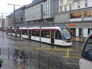 Trams pass at The Mound/Princes Street on 9 December.  The bike gives an 'Amsterdam' feel... or maybe not<br><br>[Bill Roberton 09/12/2014]