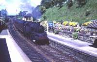 Standard tank 80058 brings an East Kilbride train into Clarkston station in 1961.<br><br>[John Robin //1961]