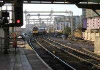 <I>Almost like the old days</I>. 2014 saw the return of the Liverpool Newcastle services to Manchester Victoria after many years of running through Piccadilly. TPE 185101 approaches the west end of Platform 3 at Victoria. This is the truncated platform that used to continue all the way through to Manchester Exchange until 1969. The train will climb Platting bank before turning right to pick up the Standedge route through Ashton-under-Lyne. <br><br>[Mark Bartlett 02/12/2014]