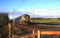 156503 heads away from Bargeddie during the early morning of 12 December 2014, two days before the end of scheduled diesel passenger services on the newly electrified Whifflet line.<br><br>[Colin McDonald 12/12/2014]
