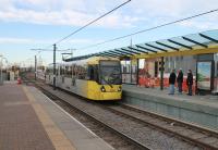 Deansgate-Castlefield is the new name for the tram stop formerly known as G-Mex. It is currently being rebuilt and the previously staggered platform has been moved alongside its counterpart. A third platform is also being built in connection with the new <I>second city crossing</I> line. 3007 rolls in with a Piccadilly service from Media City UK on 2nd December. <br><br>[Mark Bartlett 02/12/2014]