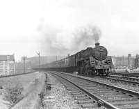 Standard class 5 4-6-0 no 73058 passing Cathcart North Junction on 19 April 1957 with a train for Uplawmoor.  <br><br>[G H Robin collection by courtesy of the Mitchell Library, Glasgow 19/04/1957]