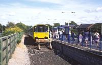 Arriving at Morecambe by rail in the 21st century is a distinctly underwheming experience, although there is at least a decent ticket office with a seated waiting area, out of shot behind the camera. The class 150 dmu just arrived from Lancaster on 7 August and forming the 16:19 to Leeds (via the Bare Lane to Hest Bank chord) gives a better level of comfort than the Pacers often encountered on this route. 	<br><br>[Bill Jamieson 07/08/2014]