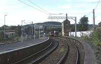 On a fine late afternoon in the summer of 2014, unit 156481 runs into the sharply curved up Furness line platform at Carnforth on the 16:10 Northern Rail Barrow to Lancaster service.<br><br>[Bill Jamieson 07/08/2014]