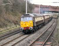 <I>Pullman</I> liveried 47790 leads a <I>Northern Belle</I> tour through Hest Bank on 16 December heading for Barrow-in-Furness. The train originated in Crewe and ran via Manchester and Bolton with 47818 on the rear. [See image 46137] of the same loco in an earlier guise on more mundane duties. <br><br>[Mark Bartlett 16/12/2014]