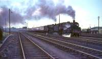 Standard Class 5 73010 pilots Jubilee 45698 <I>Mars</I> through Strawfrank Junction (now Carstairs South) on 17 July 1965 with a train for Liverpool and Manchester.  <br><br>[John Robin 17/07/1965]