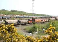 The Angel of the North watches over the various movements taking place at Tyne Yard on a fine May afternoon in 2006. Nearest the camera EWS 60047 is running into the yard with a coal train.<br><br>[John Furnevel 09/05/2006]