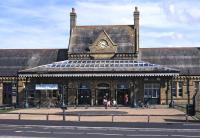 With a dual carriageway separating Morecambe Promenade station from the feature after which it was named, patience is required to obtain an unobstructed  frontal view of the main entrance canopy, seen here on 7 August 2014.<br><br>[Bill Jamieson 07/08/2014]