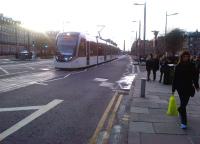 Looking south west along Shandwick Place towards Haymarket on 20 December as an Edinburgh tram approaches heading for York Place.<br><br>[John Yellowlees 20/12/2014]
