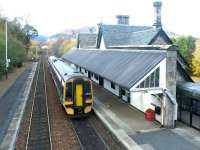 An Edinburgh - Inverness train pulls away from Dunkeld on 9 November 2003.<br><br>[John Furnevel 09/11/2003]