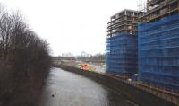 View westwards along the River Kelvin over the site of Partick Central on a miserable Sunday 21 December 2014. The new flats are now well advanced in what has been imaginatively named 'West Village'.<br><br>[Colin Miller 21/12/2014]
