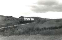 A DMU approaching Neilston High from Uplawmoor on 30 March 1962 with the last passenger service of the day. [Ref query 6566]  <br><br>[G H Robin collection by courtesy of the Mitchell Library, Glasgow 30/03/1962]