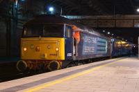 For five Saturdays DRS has provided a pair of Class 47s and 6 Mark 2 coaches to Northern to run a number of extra services between Preston and Manchester Victoria. On 20 December 2014 47853 has just arrived at Preston with the 2028 from Victoria. The driver is about to leave 47853 and head to 47818 in order to take the 2133 non-stop to Manchester.<br><br>[John McIntyre 20/12/2014]