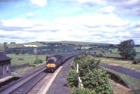An EE Type 4 brings the up <I>Royal Scot</I> through Thankerton station on 10 July 1965.<br><br>[John Robin 10/07/1965]