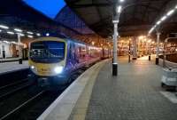 Lit up like a Christmas tree - TransPennine 185149 at Newcastle Central on 20 December,  about to form the 16.06 to Liverpool Lime Street via Manchester Piccadilly.<br><br>[Ken Strachan 20/12/2014]