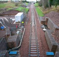 The points controlling the changeover between single and double line sections of the Borders Railway at Kings Gate, just south of the Edinburgh City Bypass, on 23 December 2014, with everything looking fairly tidy for the Christmas shut-down. The yellow sign reads, <I>'STOP - Points 536 - Contact BAM RLC before continuing'</I>. <br><br>[John Furnevel 23/12/2014]