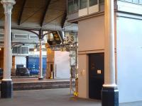 View across the platforms at the east end of Newcastle Central on 3 December 2014 showing the three goods lifts, the furthest being located in what is now the car park built on the site of the old North Tyneside bay platforms.<br><br>[David Pesterfield 03/12/2014]