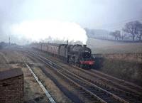 Smartly turned out by Dumfries shed, Stanier Black 5 4-6-0 no 45467 runs north through Busby Junction on 12 March 1965 with a train from Annan.<br><br>[John Robin 12/03/1965]