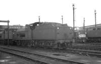 Steam and diesel locomotives on Carlisle Upperby shed in the summer of 1965. Nearest the camera is Fowler 4F 0-6-0 no 43953, recorded as being officially withdrawn by BR some four months later. <br><br>[K A Gray 03/07/1965]