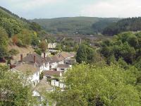 The village of Pontrhydyfen in the Afan Valley has two viaducts. The nearest structure shown here was an aqueduct, but visible through the arch is the abutment of the viaduct that carried the Rhondda and Swansea Bay line. Pontrhydyfen is also the birthplace of Richard Burton.<br><br>[John Thorn 06/08/2002]