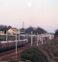 66111 approaches Baiilieston with a Longannet coal train at dusk on 3rd January 2015.<br><br>[Colin McDonald 03/01/2015]