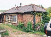 Rear of the box at Penar Junction [see image 33437]. The roadway behind is some 20 feet above the original level. The box is clearly enjoying life as a large garden shed; notice the chimney for the signalman's stove. [Ref query 6609]<br><br>[Ken Strachan 31/05/2010]