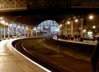 The Castle Keep seen from within Newcastle Central station at dusk on 20 December 2014.<br><br>[Ken Strachan 20/12/2014]