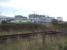 'Greenergy' bogie tank wagons in the loading facility at the Port Clarence terminal on 15 October. In the foreground is the disused branch running north towards the Seal Sands chemical complex.<br><br>[David Pesterfield 15/10/2014]