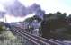 70002 <I>Geoffrey Chaucer</I> climbing through Braidwood on 16 July 1965 with a London bound relief. <br><br>[John Robin 16/07/1965]