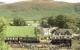 26024 arrives at Garve with a Kyle - Inverness train on 25 September 1982. Waiting to head west is Black 5 no 5025 with the Scottish Steam Railtours Group <I>Raven's Rock Express</I>. <br><br>[John Robin 25/09/1982]