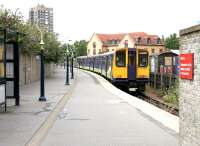 A North London Line dual voltage class 313 with a Silverlink service for Richmond awaits its departure time at the North Woolwich terminus on 5 June 2003. [see image 41202]<br><br>[John Furnevel 05/06/2003]