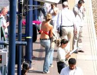 Random commuter study showing a selection of passengers on the southbound platform at West Brompton on a hot day in July 2005.<br><br>[John Furnevel 22/07/2005]