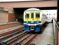 A Thameslink class 319 dual voltage EMU climbing up from the Metropolitan widened lines towards Blackfriars station on 23 July 2005 with a Luton - Sutton service.<br><br>[John Furnevel 23/07/2005]