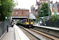 A North Woolwich - Richmond 'Silverlink' service runs under West End Lane and into platform 1 of West Hampstead station on the North London Line in July 2005. [See image 5229]<br><br>[John Furnevel 21/07/2005]