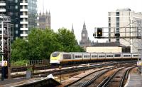 With the time on Big Ben showing 15.12, the 15.11 London Waterloo - Paris Nord Eurostar heads south from Waterloo International on 24 July 2005 and is just about to run through the north side of Vauxhall station.<br><br>[John Furnevel 24/07/2005]