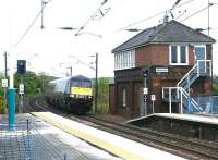 A GNER Edinburgh - Kings Cross train passing Alnmouth signal box in May 2004.<br><br>[John Furnevel 28/05/2004]