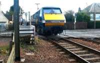 GNER Glasgow Central - Kings Cross train on Kingsknowe level crossing, Edinburgh, in October 2002.<br><br>[John Furnevel 28/10/2002]