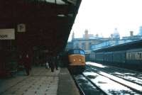 A frosty February day at Leicester Midland in 1979, as a Peak type 4 brings a St Pancras - Nottingham train under London Road and into platform 1.<br><br>[John Furnevel 11/02/1979]