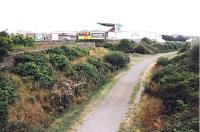 The one time approach to Leith Central passing behind Easter Road stadium in October 1997. View is towards the site of the former Easter Road Park Halt football platform.<br><br>[John Furnevel 15/10/1997]